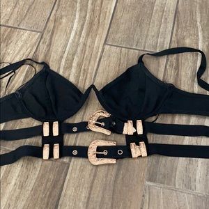 Black crop top with belt buckle design